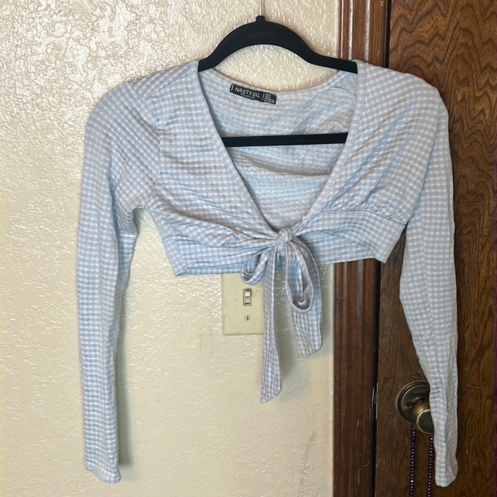Nasty gal brand long sleeve crop that ties on the front.